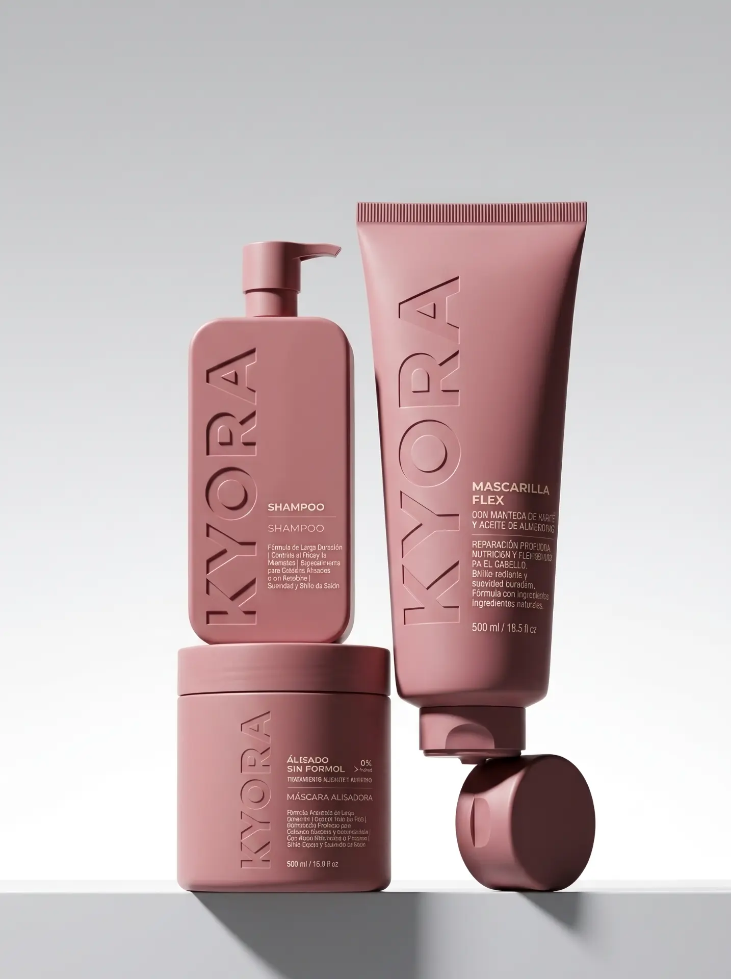 Shampoo, mascarilla y máscara alisadora de Kyora en tonos rosados